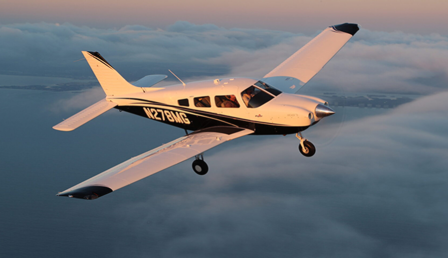 Piper PA-28 in flight with a Continental CD-155 retrofit